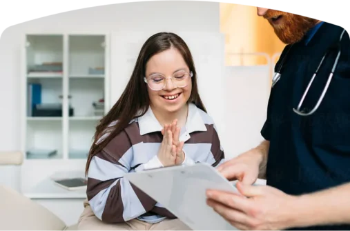 Student and teacher reviewing a document